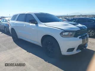 ✅ 2018 Dodge Durango R/T • VIN: 1C4SDHCT1JC403258 • Lot: 43881036. Listed on IAAI with 140,071 mi. Free auction sales archive from the USA and detailed vehicle history report at DreamBid. Image 1.
