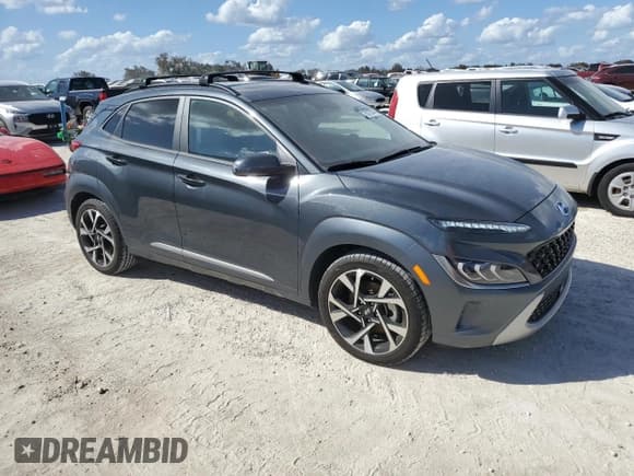 ✅ 2022 Hyundai Kona Limited • VIN: KM8K53A32NU771558 • Лот: 76175074. Опубликован ранее на Copart с пробегом 21 023 миль. Бесплатный доступ к архиву аукционных продаж из США и подробный отчёт об истории автомобиля на DreamBid. Изображение 4.