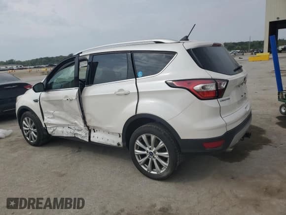 ✅ 2018 Ford Escape Titanium • VIN: 1FMCU9J98JUB25367 • Lot: 81129885. Listed on Copart with 49,037 mi. Free auction sales archive from the USA and detailed vehicle history report at DreamBid. Image 2.