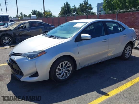 ✅ 2018 Toyota Corolla LE • VIN: 2T1BURHE3JC066597 • Lot: 43322062. Listed on IAAI with 114,237 mi. Free auction sales archive from the USA and detailed vehicle history report at DreamBid. Image 2.