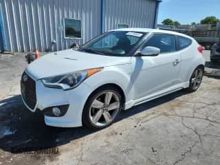 2013 Hyundai Veloster Turbo с VIN KMHTC6AE5DU128357, выставлен на аукционе Copart как лот 64139565 с пробегом 96 208 миль миль и Списание • Salvage title. История ставок и продаж доступна на DreamBid. Изображение 1.
