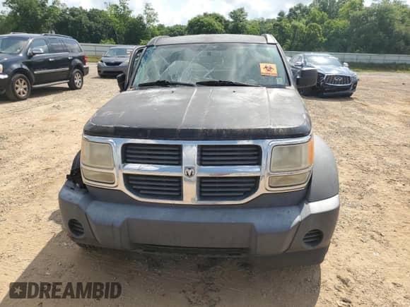 2007 Dodge Nitro SXT with VIN 1D8GT28K87W689785, listed as a Copart auction lot 57440304 with 171,738 mi miles and Salvage title. Bid and sale history available at DreamBid. Image 5.