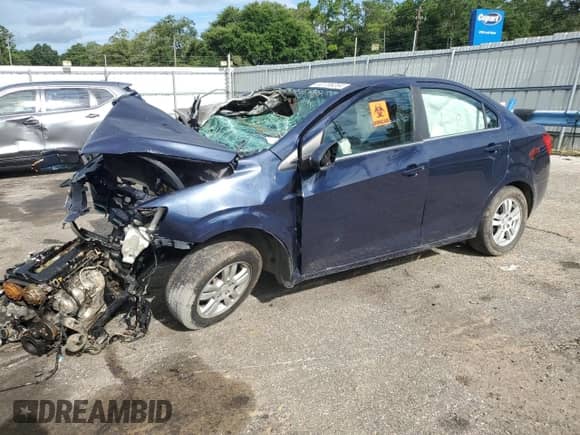 2015 Chevrolet Sonic LT с VIN 1G1JC5SH9F4216192, выставлен на аукционе Copart как лот 63706264 с пробегом Не указан миль и Списание • Salvage title. История ставок и продаж доступна на DreamBid. Изображение 1.