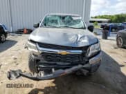 ✅ 2021 Chevrolet Colorado 4WD Work Truck • VIN: 1GCGTBEN1M1217644 • Лот: 54350535. Опубликован ранее на Copart с пробегом 101 429 миль. Бесплатный доступ к архиву аукционных продаж из США и подробный отчёт об истории автомобиля на DreamBid. Изображение 5.