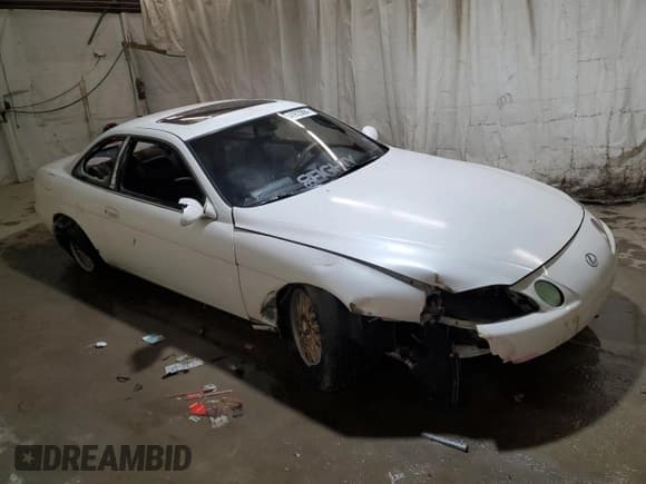 ✅ 1994 Lexus SC • VIN: JT8JZ31C4R0019232 • Lot: 41623884. Listed on Copart with 138,685 mi. Free auction sales archive from the USA and detailed vehicle history report at DreamBid. Image 4.