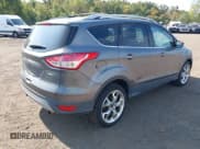 ✅ 2013 Ford Escape Titanium • VIN: 1FMCU9J99DUB51397 • Lot: 43286662. Listed on IAAI with 133,274 mi. Free auction sales archive from the USA and detailed vehicle history report at DreamBid. Image 4.