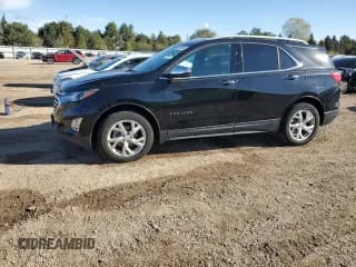 ✅ 2018 Chevrolet Equinox Premier • VIN: 3GNAXXEUXJL269798 • Lot: 87086595. Listed on Copart with 74,387 mi. Free auction sales archive from the USA and detailed vehicle history report at DreamBid. Image 1.