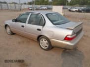 ✅ 1997 Toyota Corolla CE • VIN: 1NXBA02EXVZ612944 • Lot: 43127380. Wystawiony na IAAI z przebiegiem 230 755 mil. Bezpłatny archiwum sprzedaży aukcyjnych z USA i szczegółowy raport historii pojazdu na DreamBid. Zdjęcie 3.