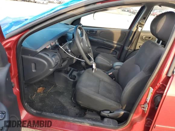 2005 Dodge Neon SXT z VIN 1B3ES56C75D173921, wystawiony jako Copart lot #85605344 z przebiegiem 133 666 mil mil oraz Szkoda całkowita • Salvage title. Historia ofert i sprzedaży dostępna na DreamBid. Obrazek 7.