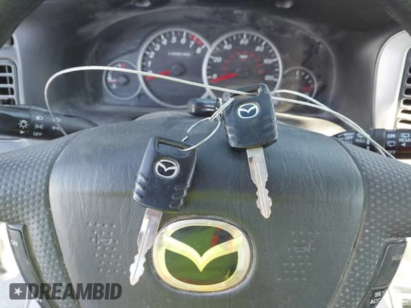 ✅ 2006 Mazda Tribute S • VIN: 4F2YZ94106KM19821 • Lot: 43410710. Listed on IAAI with 178,549 mi. Free auction sales archive from the USA and detailed vehicle history report at DreamBid. Image 11.