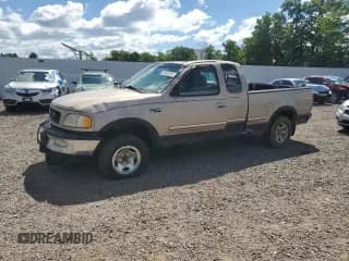 ✅ 1998 Ford F-150 • VIN: 1FTRX18L1WNA18705 • Lot: 63462335. Listed on Copart with 233,994 mi. Free auction sales archive from the USA and detailed vehicle history report at DreamBid. Image 1.