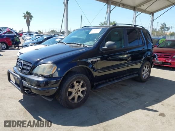 ✅ 1999 Mercedes-Benz M 320/430/500 • VIN: 4JGAB72E4XA080788 • Lot: 42821120. Listed on IAAI with 150,079 mi. Free auction sales archive from the USA and detailed vehicle history report at DreamBid. Image 17.