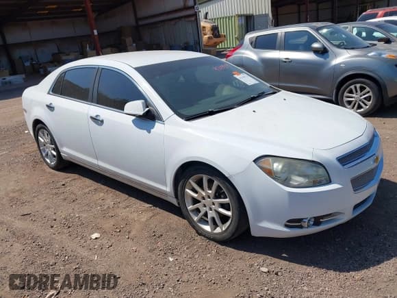 ✅ 2010 Chevrolet Malibu LTZ 1LZ • VIN: 1G1ZE5E06A4128311 • Lot: 43159174. Listed on IAAI with 131,771 mi. Free auction sales archive from the USA and detailed vehicle history report at DreamBid. Image 1.