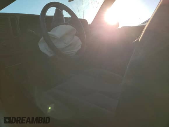 2004 Chevrolet Silverado 1500 LS z VIN 1GCEC14V54Z307206, wystawiony jako Copart lot #76308604 z przebiegiem Nie podano mil oraz Szkoda całkowita • Salvage title. Historia ofert i sprzedaży dostępna na DreamBid. Obrazek 7.