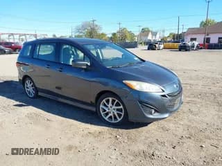 ✅ 2012 Mazda 5 Touring • VIN: JM1CW2CL3C0103270 • Lot: 43482497. Listed on IAAI with 111,330 mi. Free auction sales archive from the USA and detailed vehicle history report at DreamBid. Image 1.