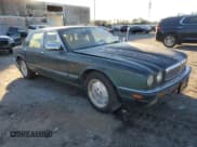 ✅ 1995 Jaguar XJ • VIN: SAJKX1747SC722815 • Лот: 83743934. Опубликован ранее на Copart с пробегом Не указан. Бесплатный доступ к архиву аукционных продаж из США и подробный отчёт об истории автомобиля на DreamBid. Изображение 4.