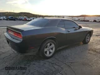 ✅ 2013 Dodge Challenger SXT • VIN: 2C3CDYAG1DH680654 • Lot: 79269494. Wystawiony na Copart z przebiegiem 145 371 mil. Bezpłatny archiwum sprzedaży aukcyjnych z USA i szczegółowy raport historii pojazdu na DreamBid. Zdjęcie 3.