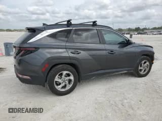 ✅ 2022 Hyundai Tucson SEL • VIN: 5NMJB3AEXNH142678 • Lot: 45166744. Wystawiony na Copart z przebiegiem 26 517 mil. Bezpłatny archiwum sprzedaży aukcyjnych z USA i szczegółowy raport historii pojazdu na DreamBid. Zdjęcie 3.