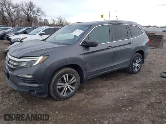 ✅ 2018 Honda Pilot EX-L • VIN: 5FNYF6H75JB012945 • Лот: 41167606. Опубликован ранее на IAAI с пробегом 73 430 миль. Бесплатный доступ к архиву аукционных продаж из США и подробный отчёт об истории автомобиля на DreamBid. Изображение 22.