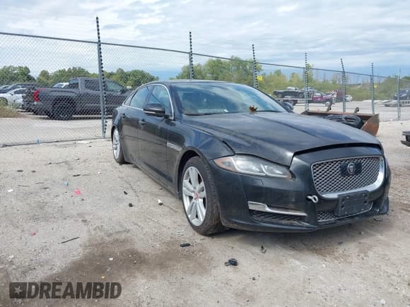 ✅ 2017 Jaguar XJ Portfolio • VIN: SAJWJ2GD4H8W04869 • Lot: 43280185. Listed on IAAI with 77,517 mi. Free auction sales archive from the USA and detailed vehicle history report at DreamBid. Image 1.