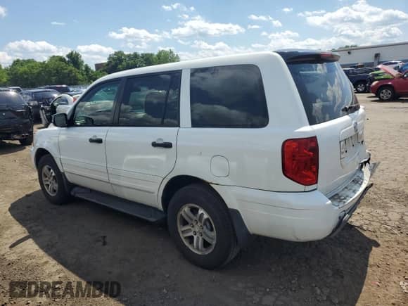 2003 Honda Pilot LX with VIN 2HKYF18173H565986, listed as a Copart auction lot 61982765 with 260,250 mi miles and Salvage title. Bid and sale history available at DreamBid. Image 2.