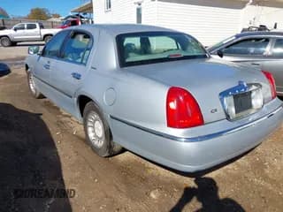 ✅ 2000 Lincoln Town Car Executive • VIN: 1LNHM81W2YY864825 • Lot: 43727399. Listed on IAAI with 197,590 mi. Free auction sales archive from the USA and detailed vehicle history report at DreamBid. Image 3.
