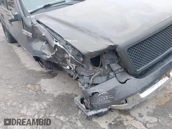 ✅ 2005 Ford F-150 XLT • VIN: 1FTRW12WX5FA40877 • Lot: 41760089. Listed on IAAI with 182,419 mi. Free auction sales archive from the USA and detailed vehicle history report at DreamBid. Image 14.