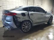 ✅ 2024 BMW X6 xDrive40i • VIN: 5UX33EX01R9S30113 • Лот: 62905085. Опубликован ранее на Copart с пробегом 10 076 миль. Бесплатный доступ к архиву аукционных продаж из США и подробный отчёт об истории автомобиля на DreamBid. Изображение 3.
