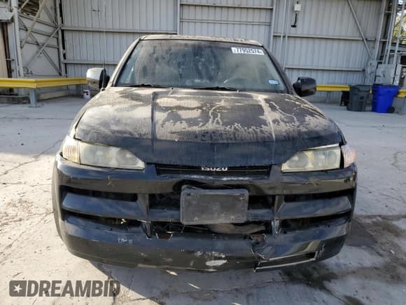 ✅ 2002 Isuzu Axiom • VIN: 4S2CE58XX24612512 • Lot: 77952574. Wystawiony na Copart z przebiegiem 201 436 mil. Bezpłatny archiwum sprzedaży aukcyjnych z USA i szczegółowy raport historii pojazdu na DreamBid. Zdjęcie 5.