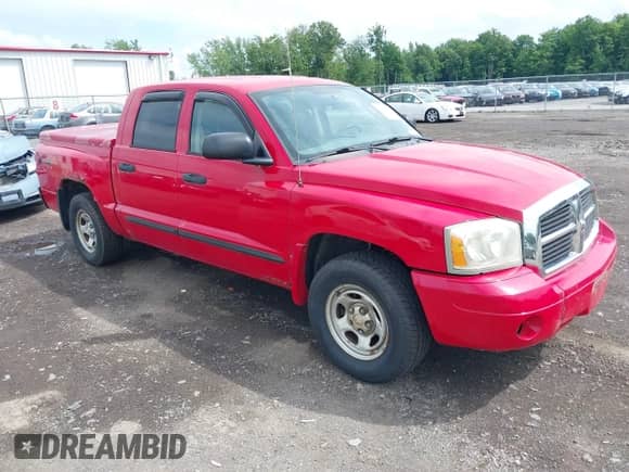 2007 Dodge Dakota SLT z VIN 1D7HW48N17S128373, wystawiony jako IAAI lot #42633897 z przebiegiem 129 780 mil mil oraz . Historia ofert i sprzedaży dostępna na DreamBid. Obrazek 1.