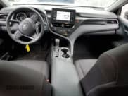 ✅ 2021 Toyota Camry Hybrid LE • VIN: 4T1C31AK9MU552245 • Lot: 82777145. Listed on Copart with 80,646 mi. Free auction sales archive from the USA and detailed vehicle history report at DreamBid. Image 8.