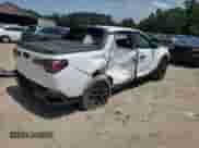 2022 Hyundai Santa Cruz SEL with VIN 5NTJBDAE3NH031402, listed as a Copart auction lot 59887415 with 48,156 mi miles and Salvage title. Bid and sale history available at DreamBid. Image 3.