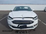 ✅ 2017 Ford Fusion Hybrid SE • VIN: 3FA6P0LU6HR355406 • Lot: 43581175. Listed on IAAI with 112,942 mi. Free auction sales archive from the USA and detailed vehicle history report at DreamBid. Image 13.