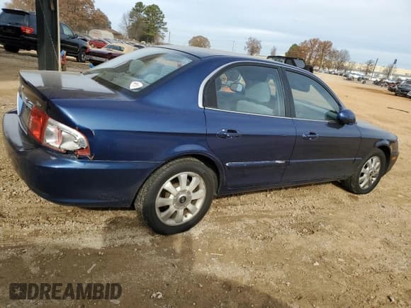 ✅ 2005 Kia Optima LX • VIN: KNAGD128955423159 • Lot: 84280734. Listed on Copart with 92,428 mi. Free auction sales archive from the USA and detailed vehicle history report at DreamBid. Image 3.