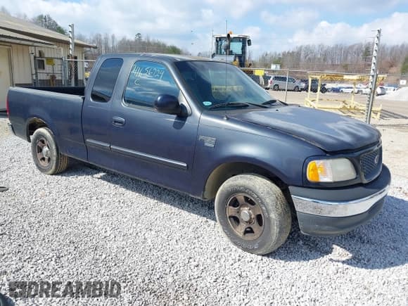 ✅ 2001 Ford F-150 XL • VIN: 1FTRX17W41NA28584 • Lot: 41656724. Listed on IAAI with 168,400 mi. Free auction sales archive from the USA and detailed vehicle history report at DreamBid. Image 1.