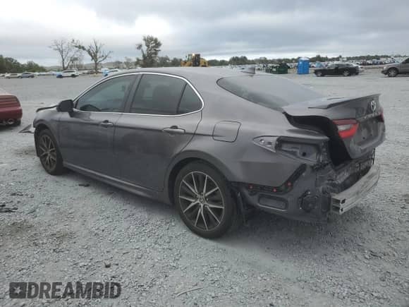 2024 Toyota Camry SE with VIN 4T1T11AK8RU851884, listed as a Copart auction lot 82341125 with 32,168 mi miles and Salvage title. Bid and sale history available at DreamBid. Image 2.
