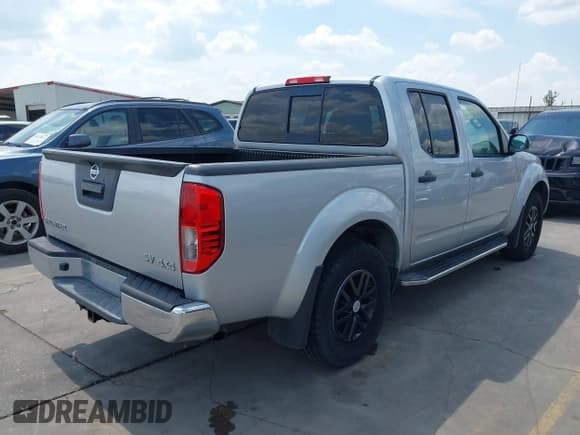✅ 2019 Nissan Frontier SV • VIN: 1N6AD0EV1KN761443 • Lot: 43256553. Listed on IAAI with 96,867 mi. Free auction sales archive from the USA and detailed vehicle history report at DreamBid. Image 4.