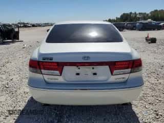 2006 Hyundai Azera SE z VIN KMHFC46F76A112099, wystawiony jako Copart lot #76604094 z przebiegiem Nie podano mil oraz Szkoda całkowita • Salvage title. Historia ofert i sprzedaży dostępna na DreamBid. Obrazek 6.