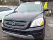 2004 Honda Pilot LX with VIN 2HKYF18194H614848, listed as a IAAI auction lot 42022016 with 171,465 mi miles and . Bid and sale history available at DreamBid. Image 13.