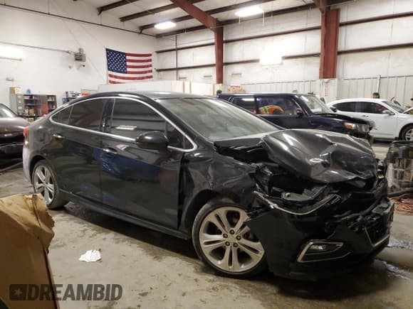 ✅ 2017 Chevrolet Cruze Premier • VIN: 1G1BF5SM1H7163028 • Lot: 72576042. Listed on Copart with 96,530 mi. Free auction sales archive from the USA and detailed vehicle history report at DreamBid. Image 4.