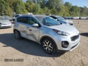 ✅ 2017 Kia Sportage SX Turbo • VIN: KNDPR3A69H7067319 • Lot: 82233155. Listed on Copart with 106,970 mi. Free auction sales archive from the USA and detailed vehicle history report at DreamBid. Image 4.
