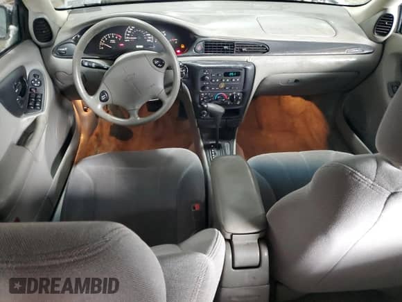 2003 Chevrolet Malibu z VIN 1G1ND52J13M701214, wystawiony jako Copart lot #87434834 z przebiegiem 67 003 mil mil oraz Szkoda całkowita • Salvage title. Historia ofert i sprzedaży dostępna na DreamBid. Obrazek 8.