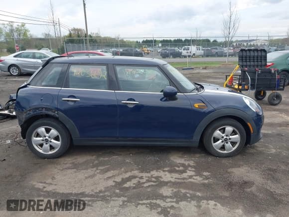 ✅ 2015 MINI Hardtop 4 Door • VIN: WMWXS5C54FT828442 • Lot: 42036692. Listed on IAAI with 88,224 mi. Free auction sales archive from the USA and detailed vehicle history report at DreamBid. Image 14.