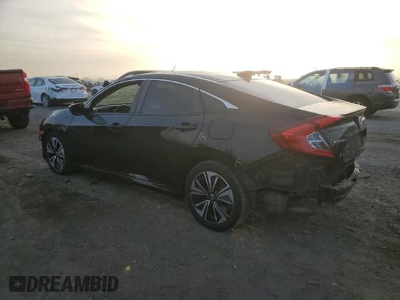 ✅ 2018 Honda Civic EX-T • VIN: JHMFC1F33JX016144 • Лот: 92129945. Опубликован ранее на Copart с пробегом 183 885 миль. Бесплатный доступ к архиву аукционных продаж из США и подробный отчёт об истории автомобиля на DreamBid. Изображение 2.