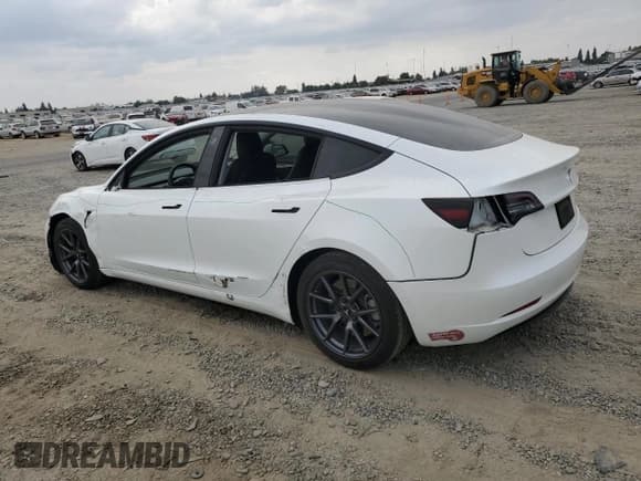 ✅ 2021 Tesla Model 3 Standard Range Plus • VIN: 5YJ3E1EA5MF063527 • Лот: 80827995. Опубликован ранее на Copart с пробегом 79 667 миль. Бесплатный доступ к архиву аукционных продаж из США и подробный отчёт об истории автомобиля на DreamBid. Изображение 2.