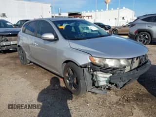 ✅ 2012 Kia Forte SX • VIN: KNAFW5A37C5490343 • Lot: 43804378. Listed on IAAI with 83,674 mi. Free auction sales archive from the USA and detailed vehicle history report at DreamBid. Image 1.