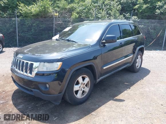 ✅ 2011 Jeep Grand Cherokee Laredo • VIN: 1J4RR4GG7BC596730 • Lot: 42473954. Listed on IAAI with 163,674 mi. Free auction sales archive from the USA and detailed vehicle history report at DreamBid. Image 2.