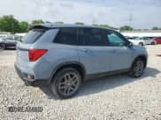 ✅ 2022 Honda Passport EX-L • VIN: 5FNYF8H52NB031405 • Lot: 57150355. Listed on Copart with 55,152 mi. Free auction sales archive from the USA and detailed vehicle history report at DreamBid. Image 3.