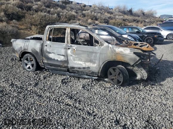 ✅ 2022 Honda Ridgeline RTL-E • VIN: 5FPYK3F74NB010596 • Lot: 90921415. Listed on Copart with Not provided. Free auction sales archive from the USA and detailed vehicle history report at DreamBid. Image 4.