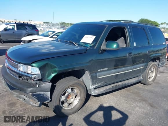 ✅ 2002 Chevrolet Tahoe LS • VIN: 1GNEC13V02R231836 • Lot: 43587799. Listed on IAAI with 159,744 mi. Free auction sales archive from the USA and detailed vehicle history report at DreamBid. Image 2.